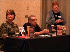 With Denny Griffin and Marilyn Meredith before our panel--very serious!